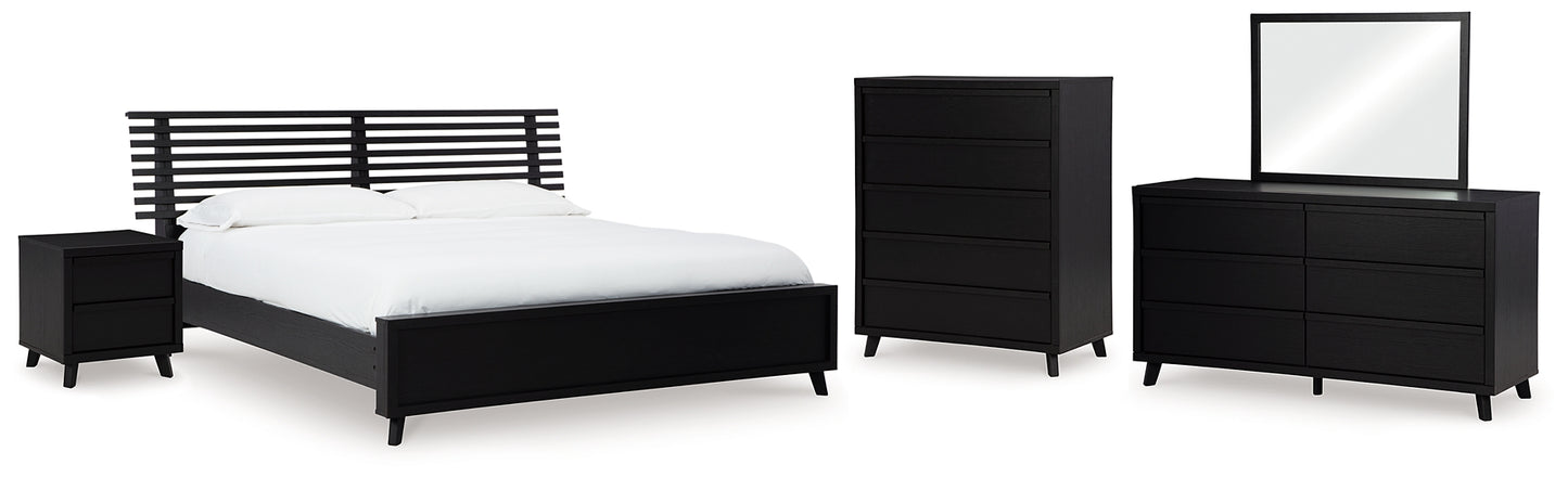 Danziar Queen Panel Bed with Mirrored Dresser, Chest and Nightstand