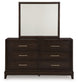 Neymorton Queen Upholstered Panel Bed with Mirrored Dresser and 2 Nightstands