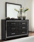 Kaydell King Upholstered Panel Headboard with Mirrored Dresser