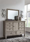 Harrastone Queen Panel Bed with Mirrored Dresser